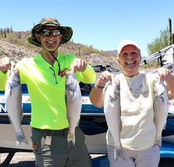 2 AZ Fishing trip customers with 4 large fish